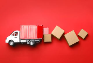 Toy truck delivering boxes