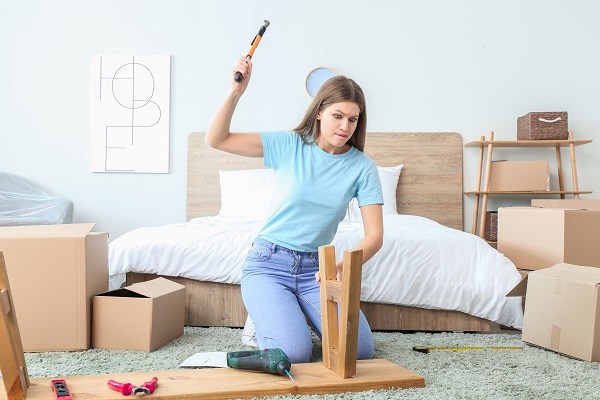 Woman building furniture