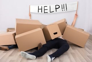 Man Trapped Under Boxes