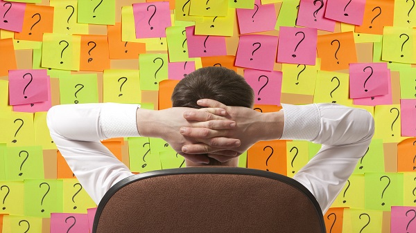 Man staring at questions