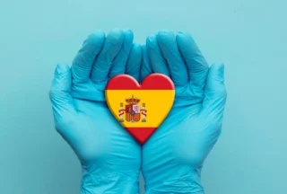 Hands Holding Spanish Heart