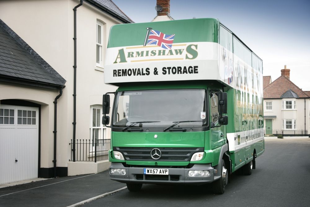 Removals lorry and house