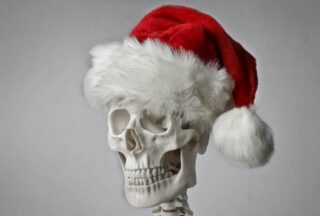 Skeleton in Santa hat
